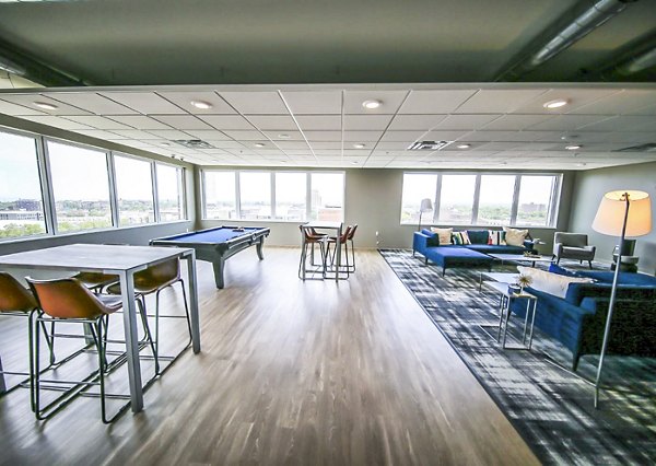 Clubhouse with modern design and entertainment area at The Edge Apartments, luxury living offered by Greystar