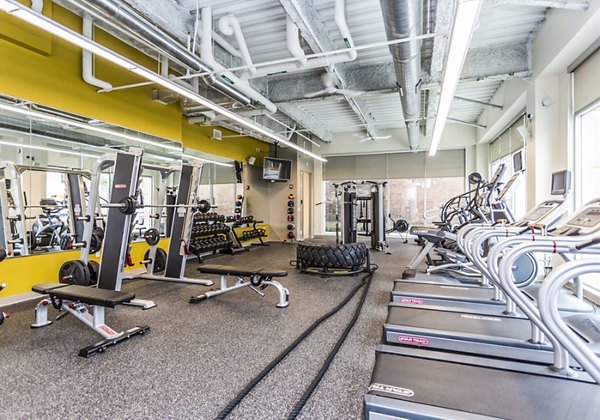 State-of-the-art fitness center with modern equipment at The Edge Apartments