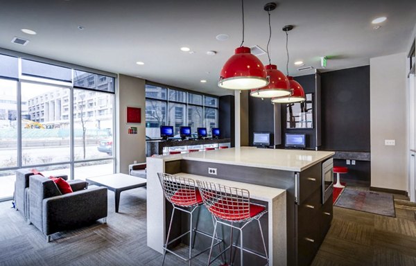 Inviting clubhouse study area with modern furnishings at The Langston Apartments, a Greystar luxury apartment community