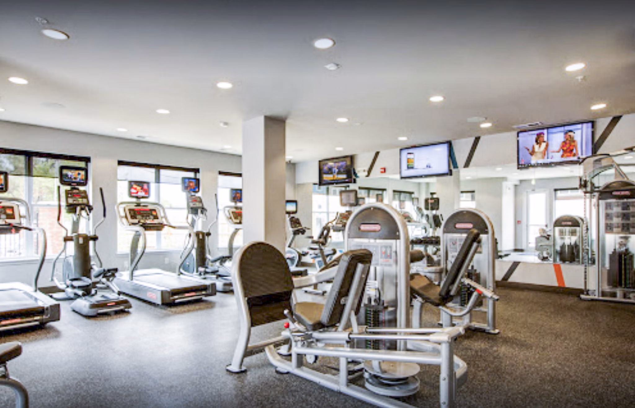 State-of-the-art fitness center with modern equipment at The Langston Apartments luxury complex