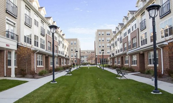 Courtyard with lush greenery at The Langston Apartments, a luxury Greystar property with relaxing outdoor spaces