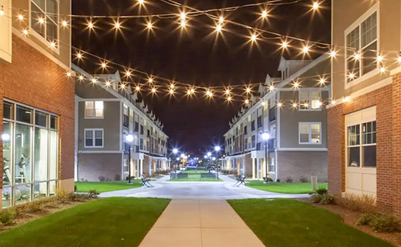 Elegant courtyard with lush landscaping at The Langston Apartments for relaxation and leisure