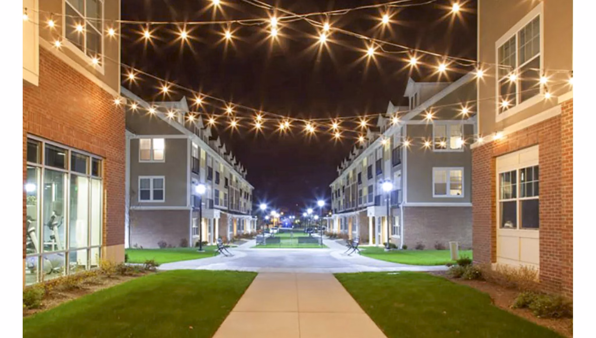 Elegant courtyard with lush landscaping at The Langston Apartments for relaxation and leisure