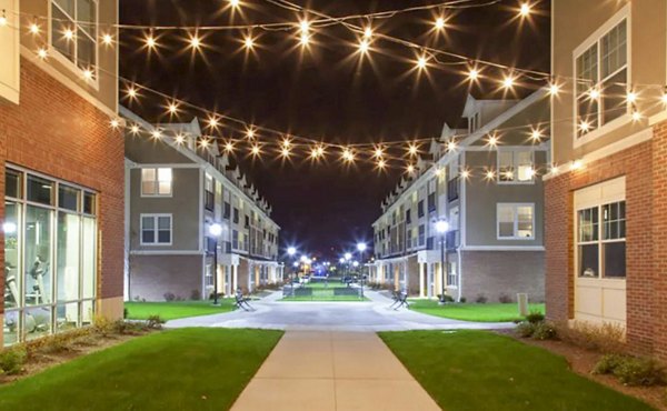 Elegant courtyard with lush landscaping at The Langston Apartments for relaxation and leisure