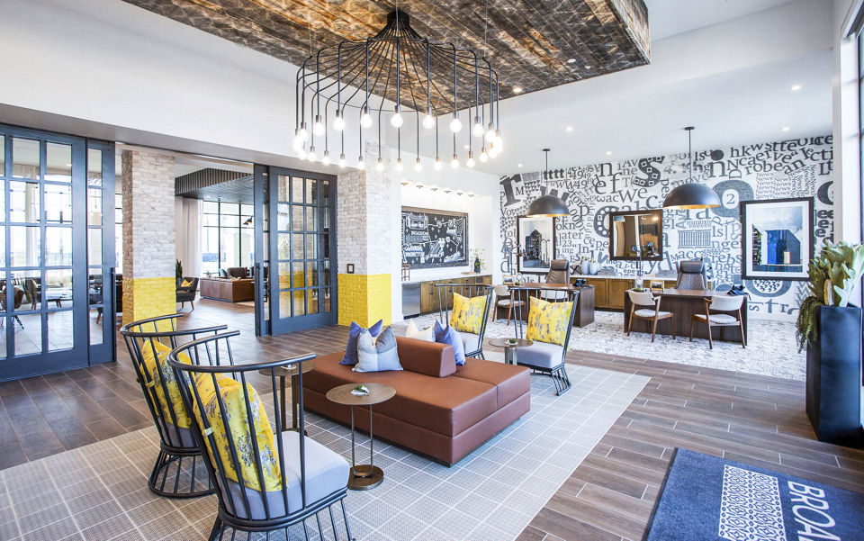 Modern clubhouse and leasing office at Broadstone North Ridge Apartments featuring elegant design and spacious meeting areas