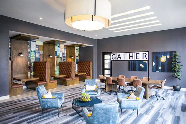 Clubhouse featuring cozy lounge and modern decor at Broadstone North Ridge Apartments