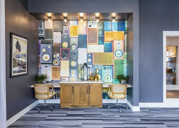 Clubhouse featuring a modern lounge and cozy seating at Broadstone North Ridge Apartments