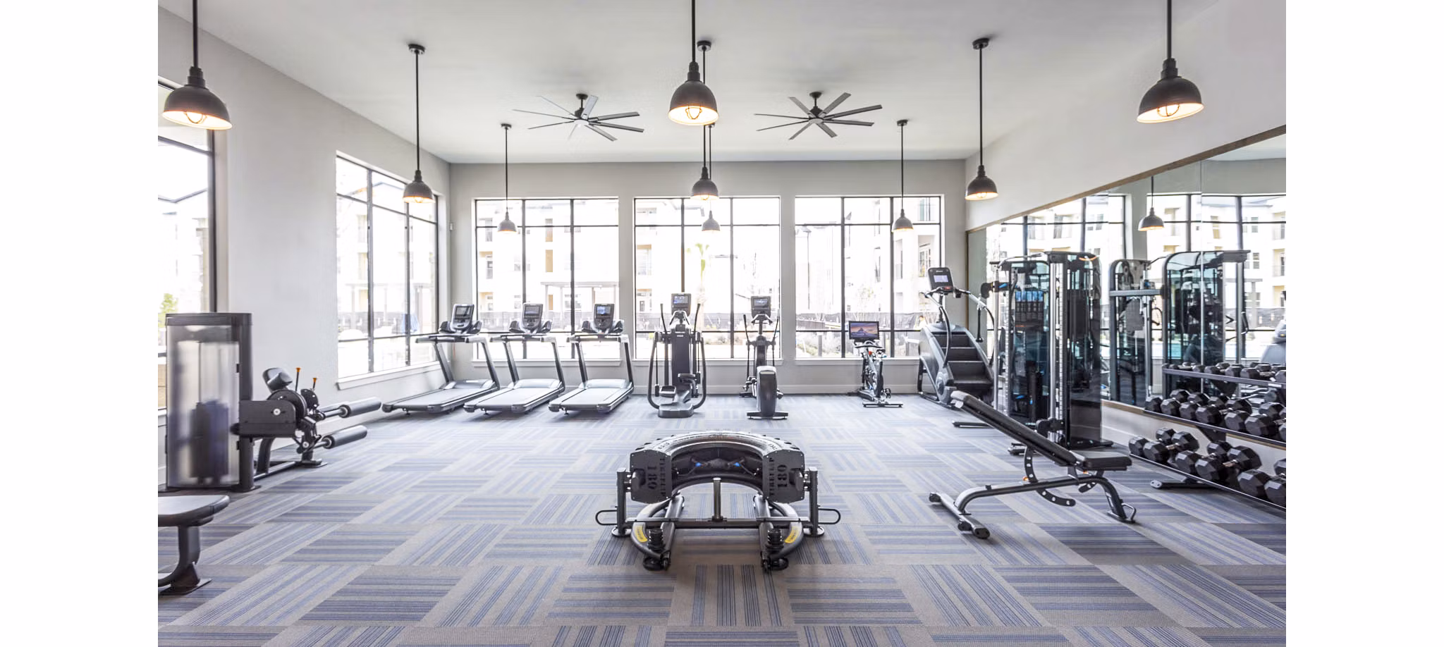 Modern fitness center with top-of-the-line equipment at Broadstone North Ridge Apartments