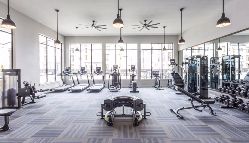 Modern fitness center with top-of-the-line equipment at Broadstone North Ridge Apartments