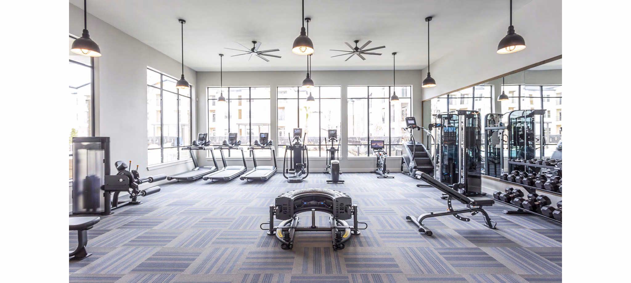 Modern fitness center with top-of-the-line equipment at Broadstone North Ridge Apartments