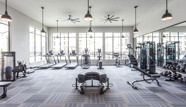 Modern fitness center with top-of-the-line equipment at Broadstone North Ridge Apartments