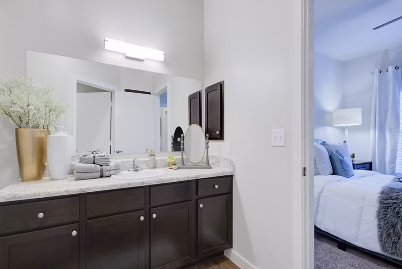 Luxurious bathroom with modern fixtures at Roots at O'Connor Apartments