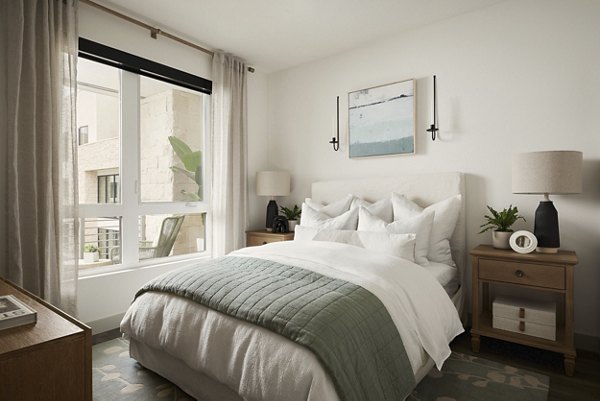 Elevate your living experience in the stylish bedroom at Santal Thousand Oaks Apartments, featuring elegant design and ample natural light