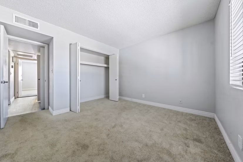 Cozy bedroom with modern decor at Villatree Apartments