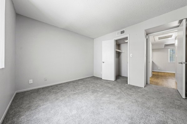 Cozy bedroom with modern decor in Villatree Apartments