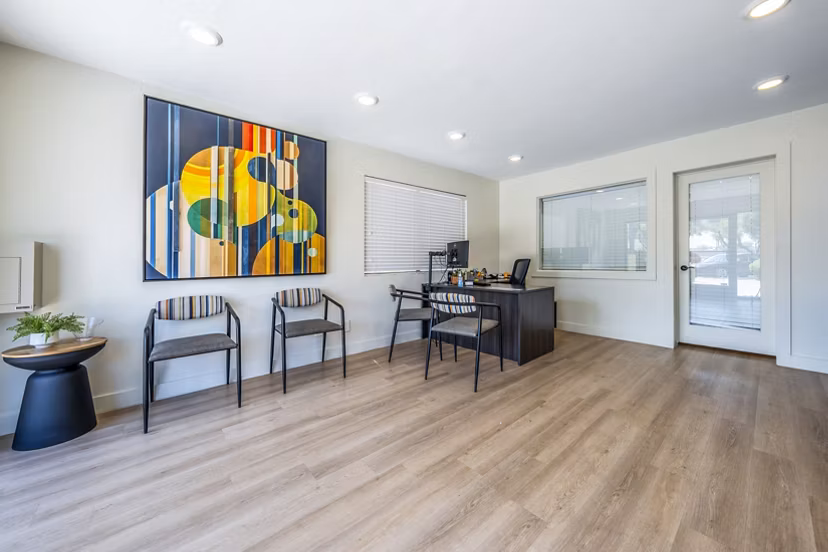 Modern clubhouse and leasing office at Villatree Apartments featuring stylish interiors and welcoming atmosphere