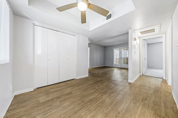 Dining area with modern furniture and stylish lighting at Villatree Apartments luxury homes