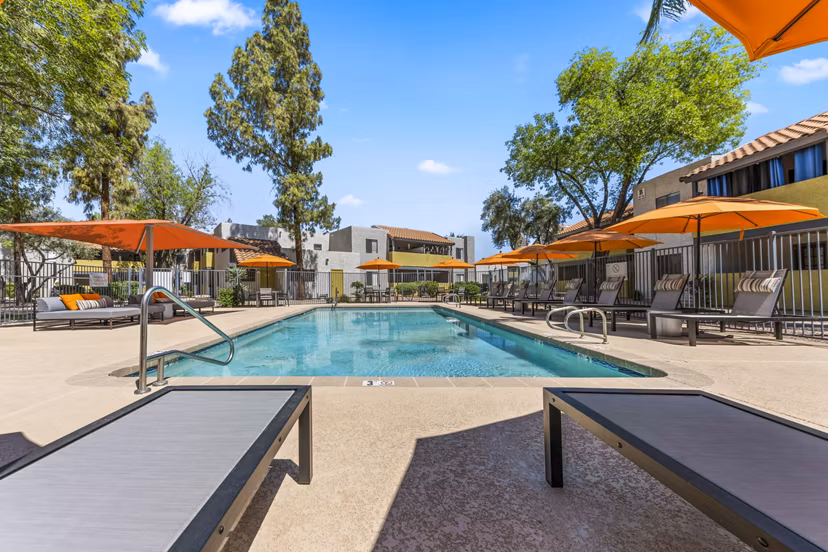 Inviting outdoor pool area at Villatree Apartments offering relaxation and leisure with modern design elements