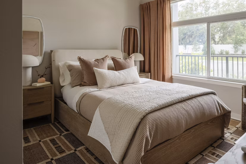 Elegant bedroom with modern design at Lynwind Apartments