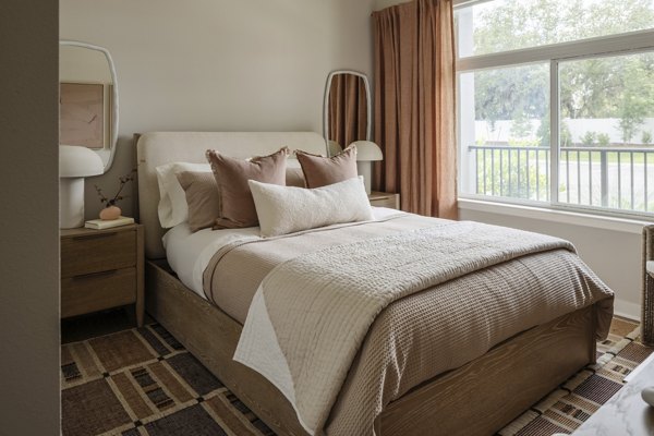 Elegant bedroom with modern design at Lynwind Apartments