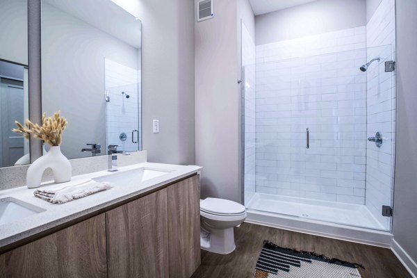 Contemporary bathroom with elegant fixtures at Lynwind Apartments