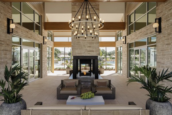 Elegant clubhouse with modern decor at Lynwind Apartments, perfect for social gatherings and events in this luxury community