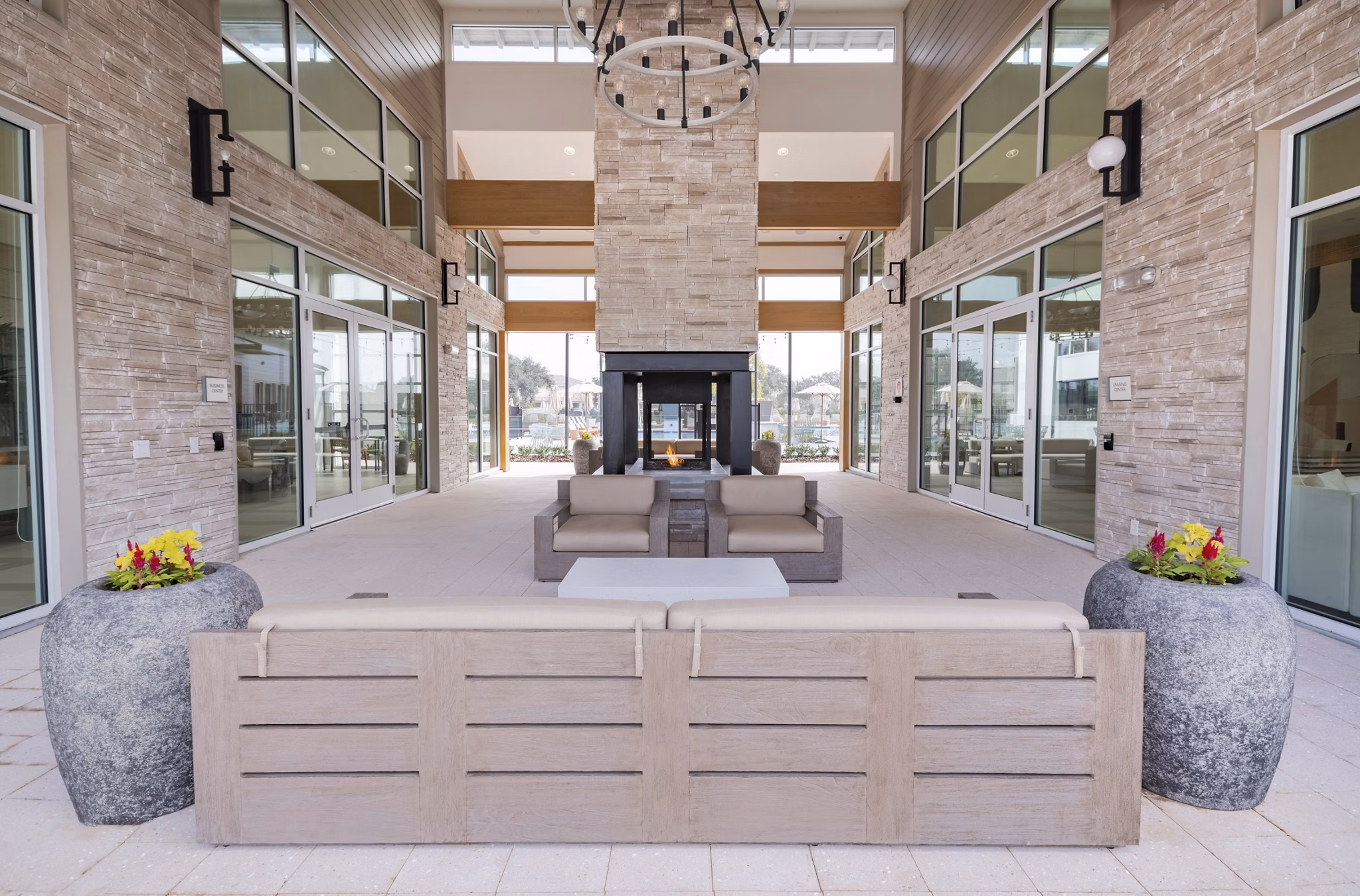 Chic outdoor patio with cozy seating at Lynwind Apartments, ideal for relaxation and socializing in a modern setting
