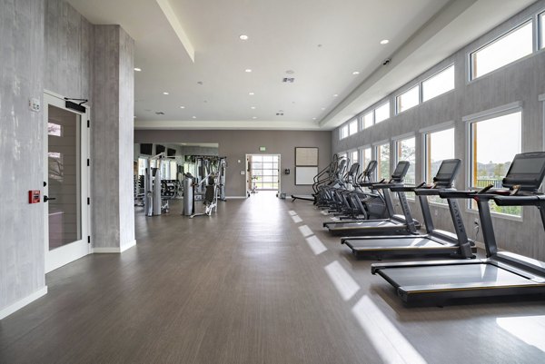 Modern fitness center with state-of-the-art equipment at Lynwind Apartments, perfect for active lifestyles and wellness-focused residents