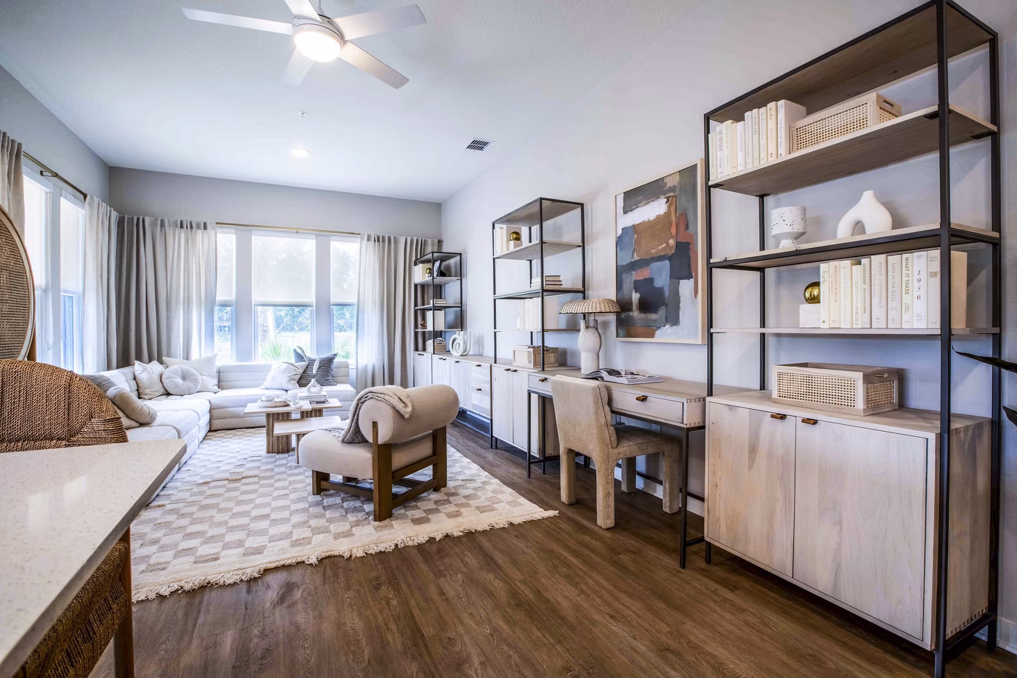 Spacious living room with modern decor at Lynwind Apartments, showcasing luxury living and comfort in a contemporary setting