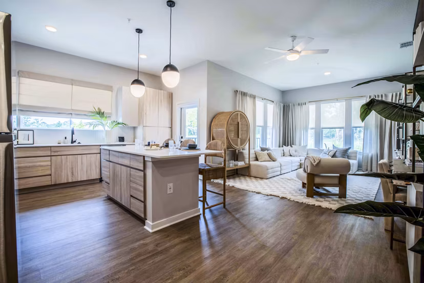 Cozy living room with plush seating and modern decor in Lynwind Apartments, Greystar luxury community