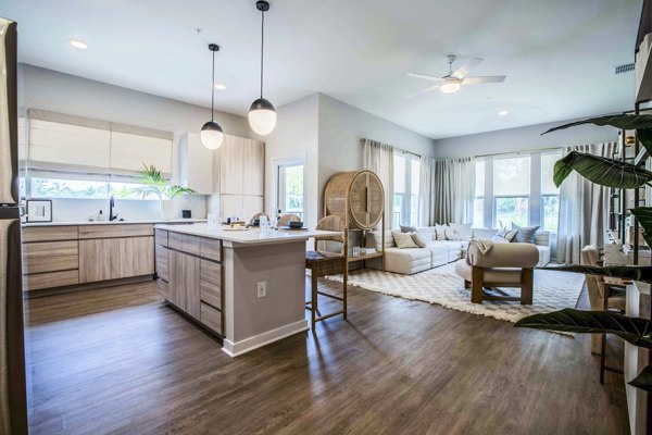 Cozy living room with plush seating and modern decor in Lynwind Apartments, Greystar luxury community
