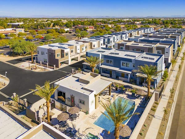 Town Surprise Apartments: Modern luxury townhomes with a brick in a serene neighborhood