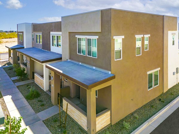 Town Surprise Apartments Townhomes: Elegant townhome exteriors in a serene neighborhood