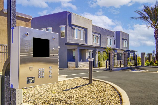 Town Surprise Apartments: Elegant gated entry at luxury townhomes