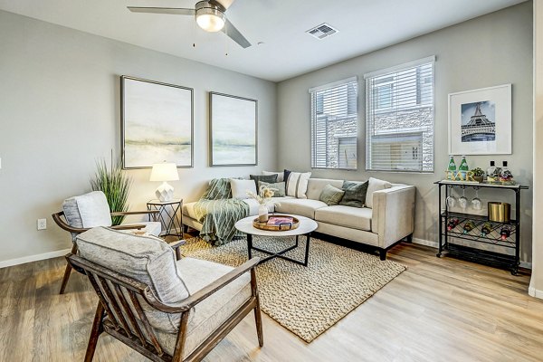 Spacious living room with modern decor at Town Surprise Townhome Apartments