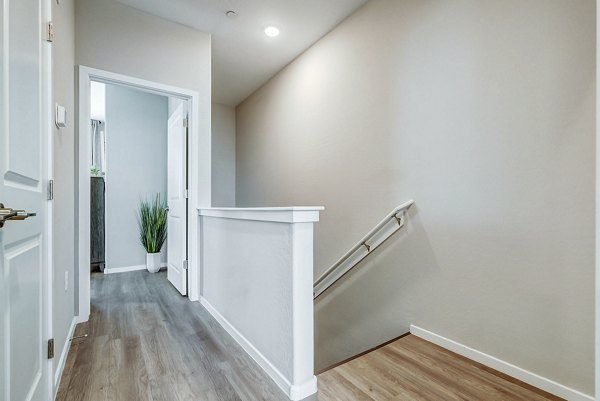 hallway/stairway at Town Surprise Townhome Apartments