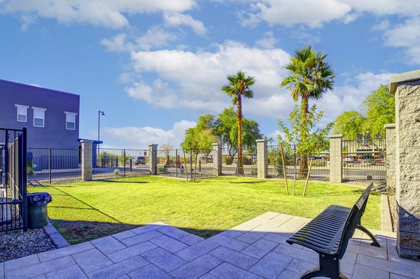 Dog park with agility equipment at Town Surprise Apartment Townhomes