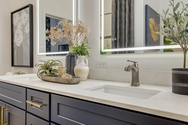 Modern bathroom with sleek fixtures in Midtown 205 Apartments, featuring luxury design and spacious layout