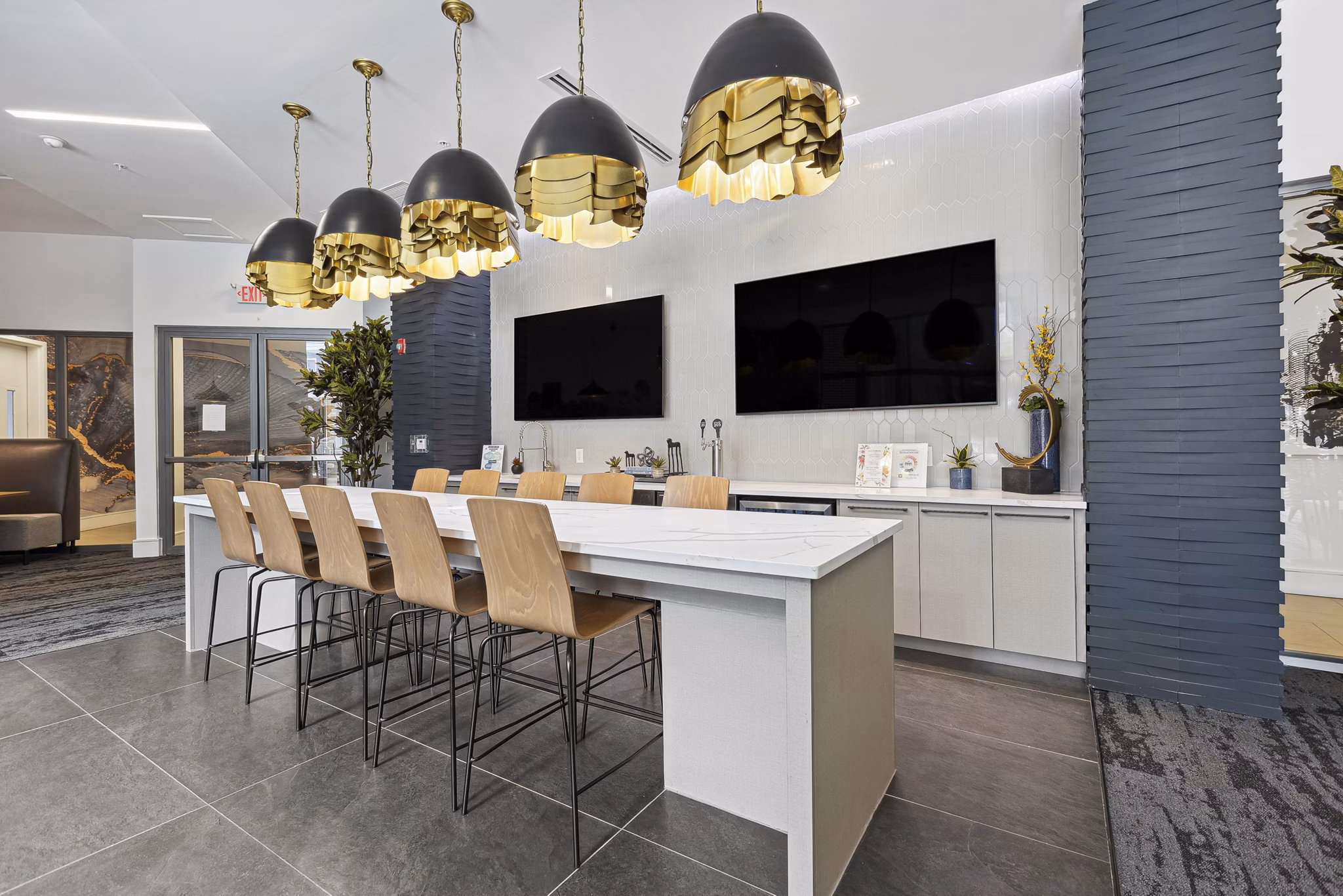 Clubhouse at Midtown 205 Apartments: Modern design with cozy seating and entertainment options in Uptown Charlotte