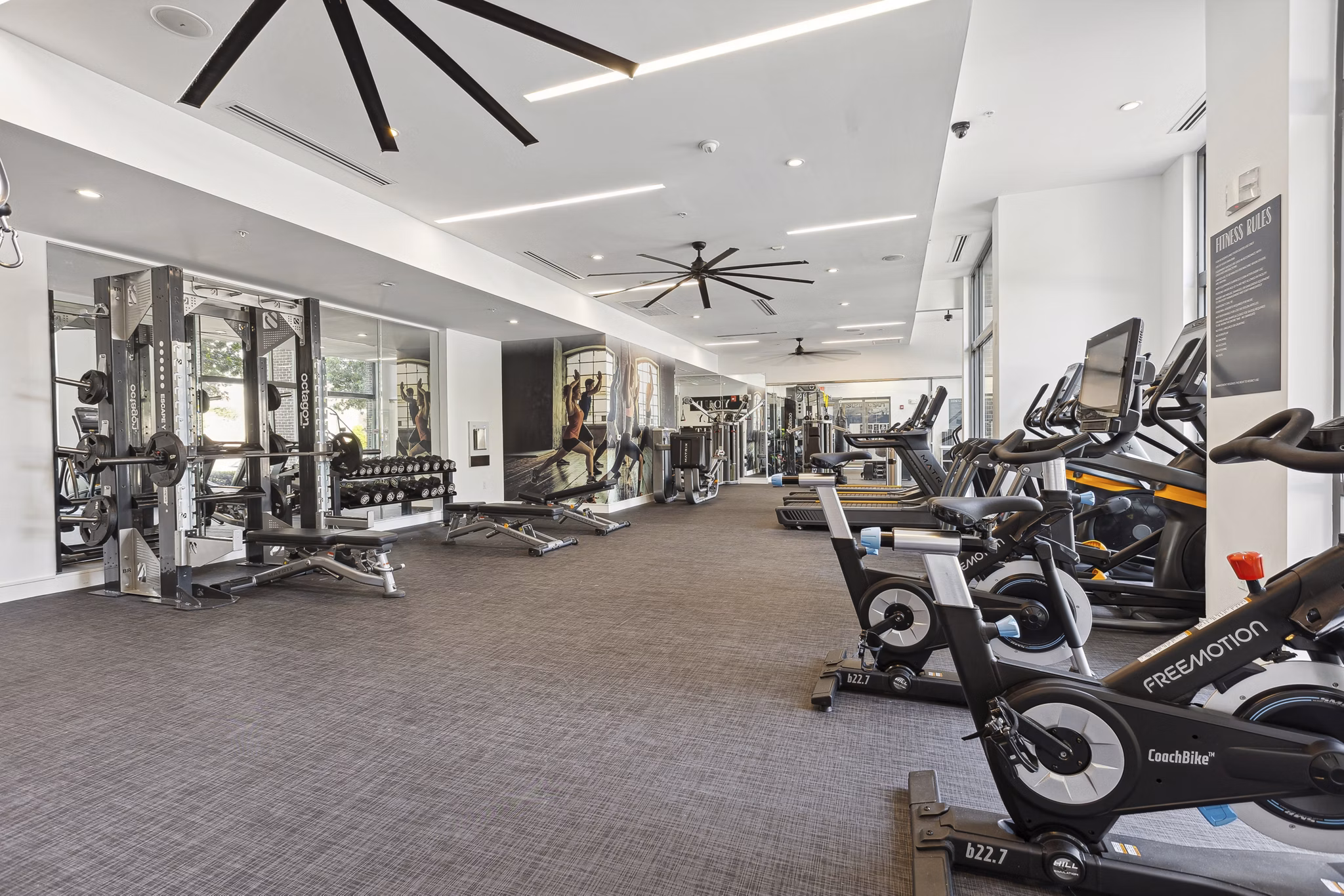 Fitness center with modern equipment at Midtown 205 Apartments offering residents a premium workout experience