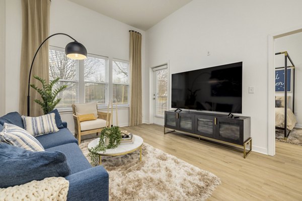 Spacious living room with contemporary furnishings in Midtown 205 Apartments