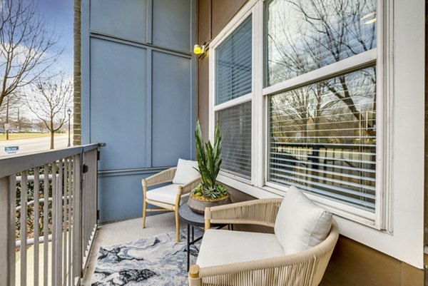 Scenic outdoor patio with cozy seating at Midtown 205 Apartments