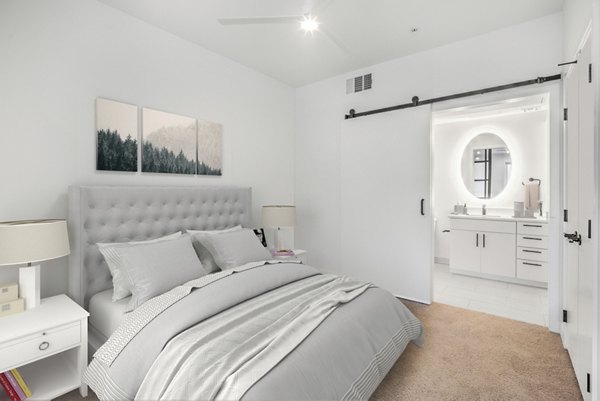 Spacious bedroom with modern furnishings at Parc Haven Apartments, offering luxury living in a prime location