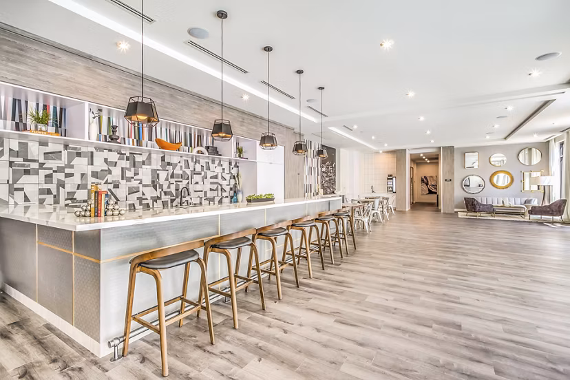 Clubhouse with modern decor and seating areas at Parc Haven Apartments in a luxury setting