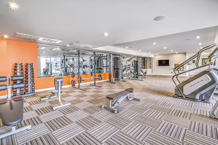 State-of-the-art fitness center featuring modern equipment at Parc Haven Apartments