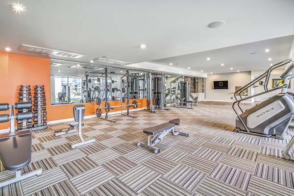 State-of-the-art fitness center featuring modern equipment at Parc Haven Apartments