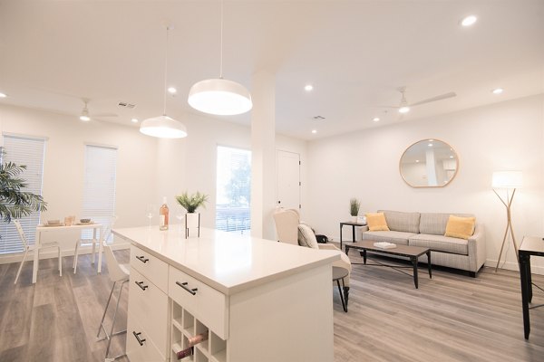 Open-concept dining area with modern furnishings at Parc Haven Apartments