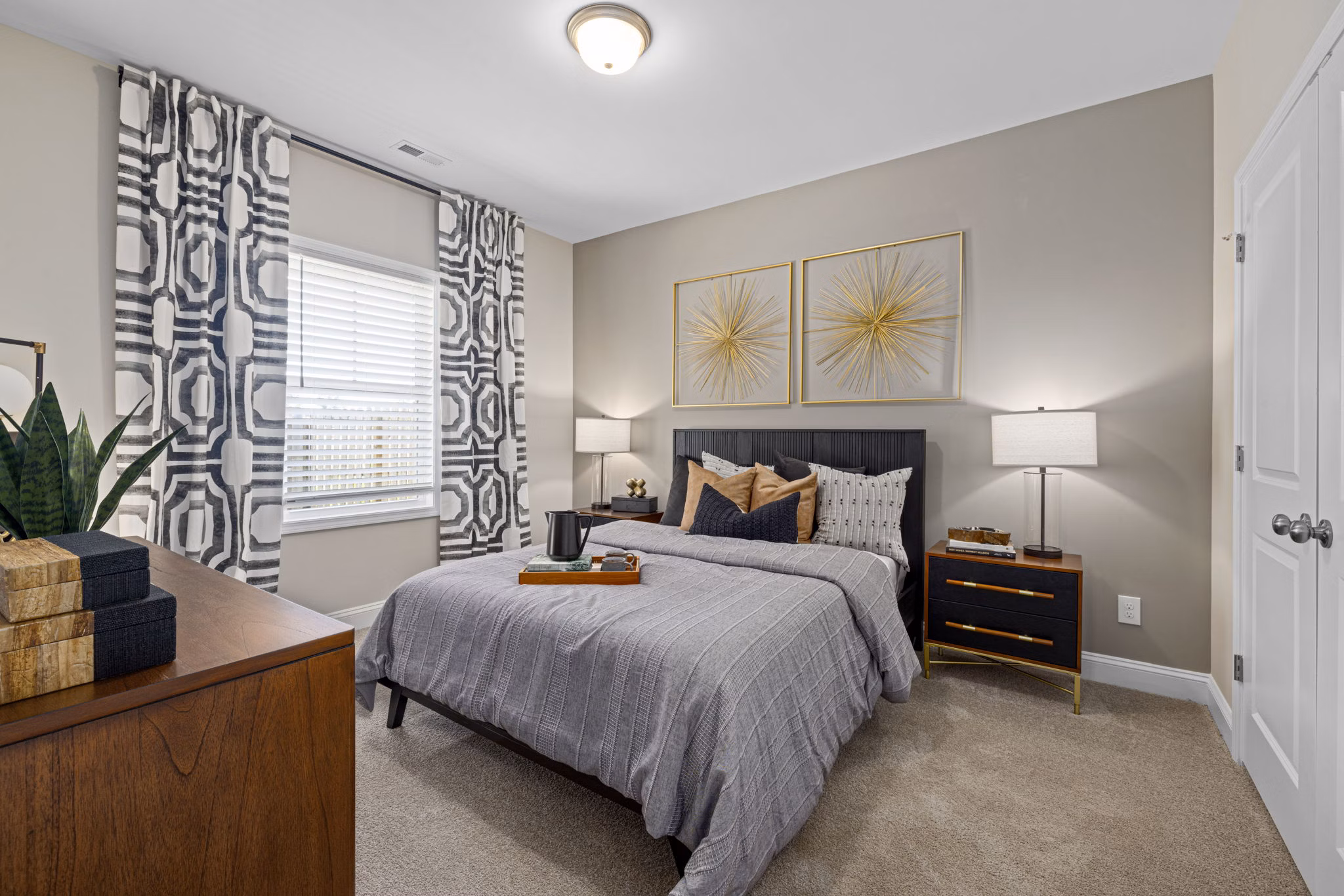 Modern bedroom with natural light and elegant decor at Banyan Silo Ridge Apartments Perfect blend of style and comfort in luxury living spaces