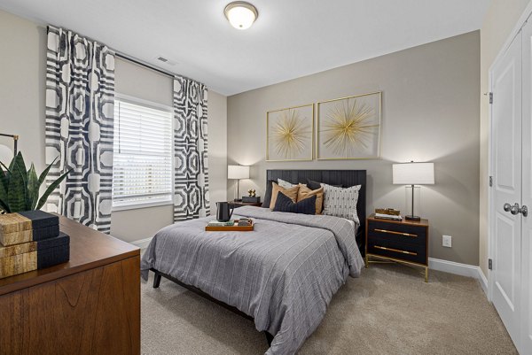 Modern bedroom with natural light and elegant decor at Banyan Silo Ridge Apartments Perfect blend of style and comfort in luxury living spaces