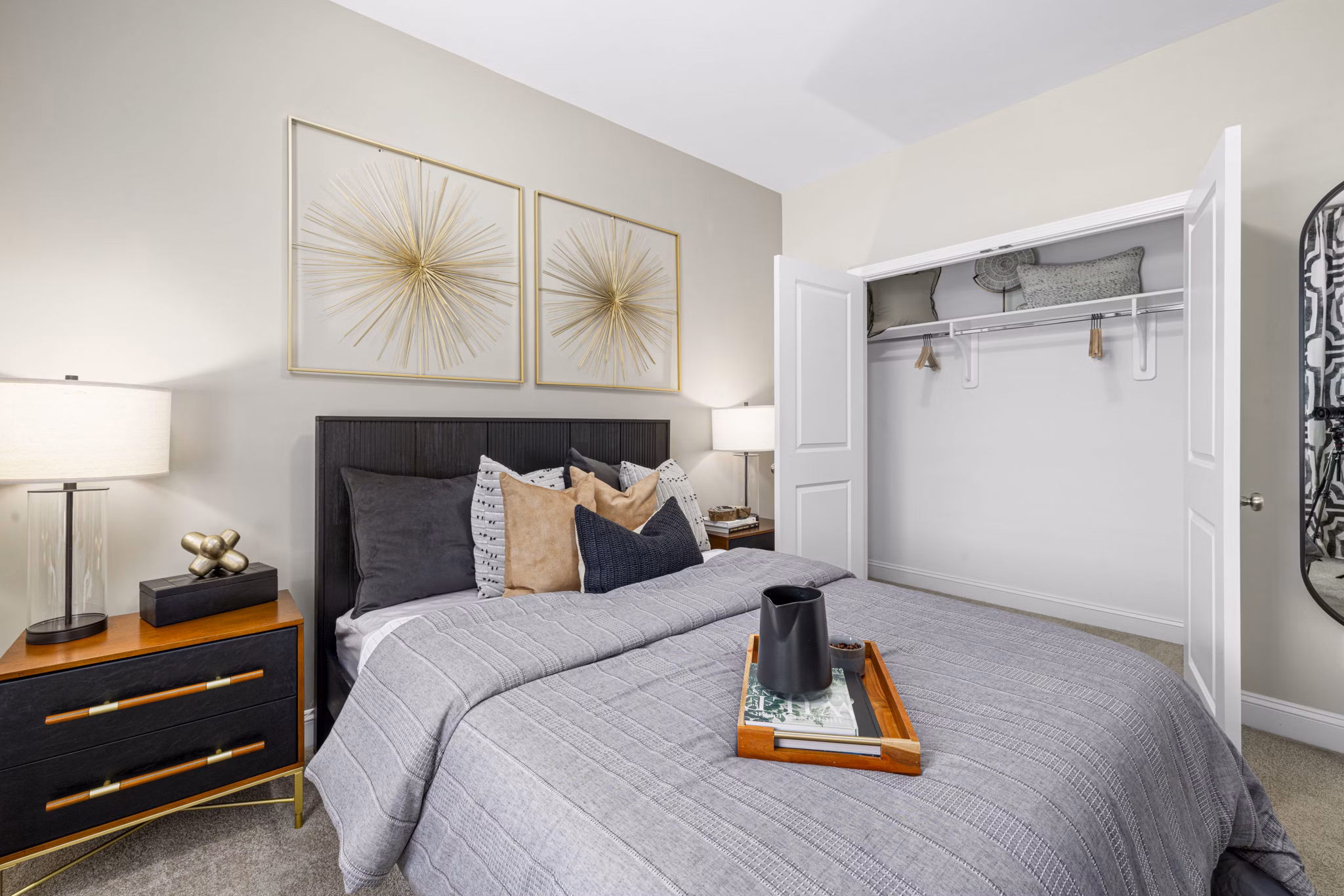 Cozy bedroom with neutral tones and large window at Banyan Silo Ridge Apartments